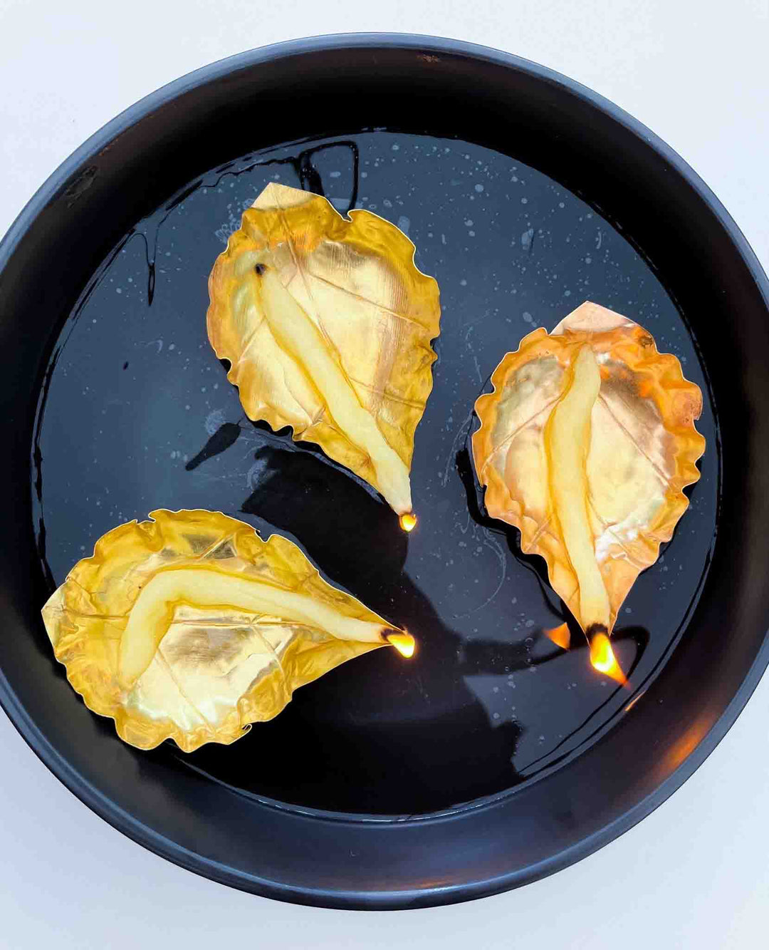 Brass Floating Leaf Shaped Lamps (Diyas) | Tea-light candle holder.